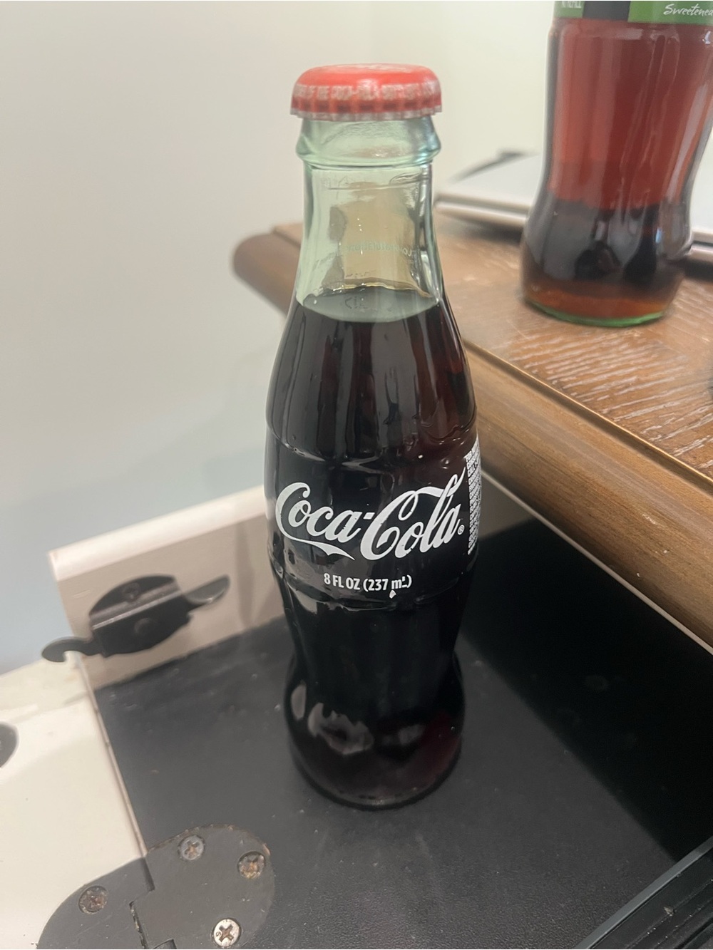 Alabama 2009 Coca Cola Glass Bottle with Red Cap and Black Liquid Label
